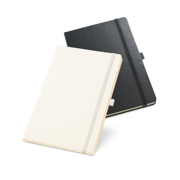 Caderno A5 com páginas pautadas